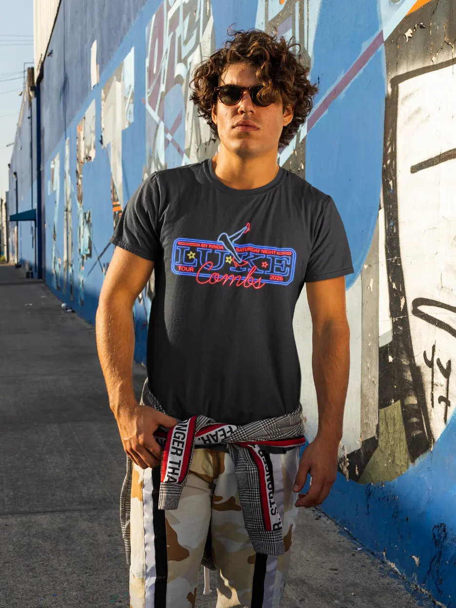 model wearing black luke combs t-shirt